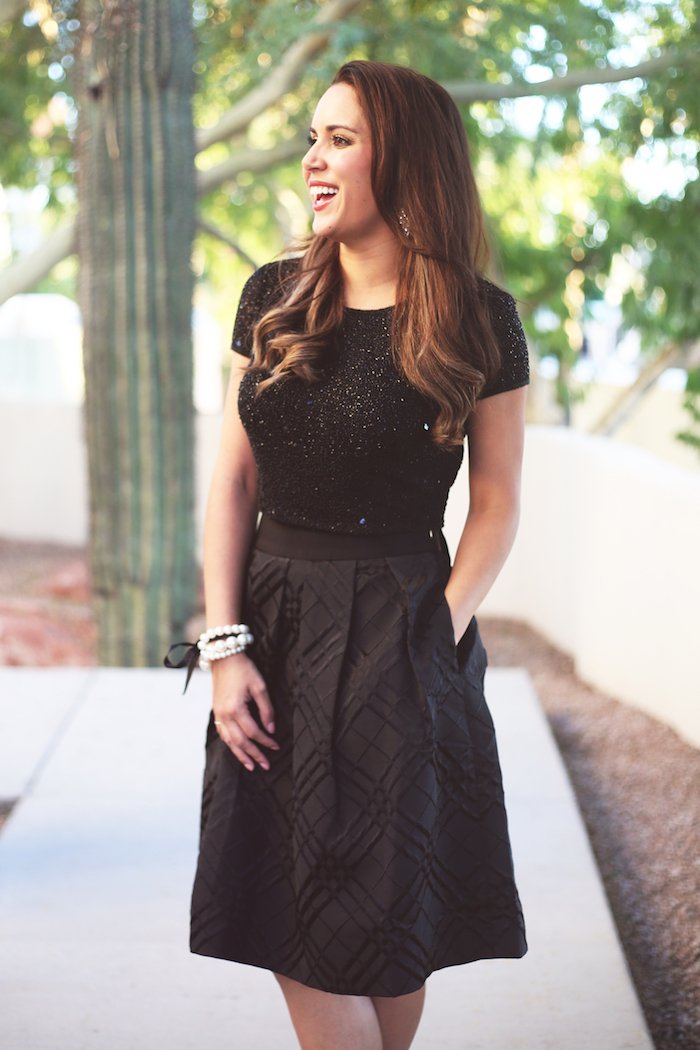 Black bow skirt + sequin crop top, cute holiday outfit idea. Click to see the rest of the look on the blog!