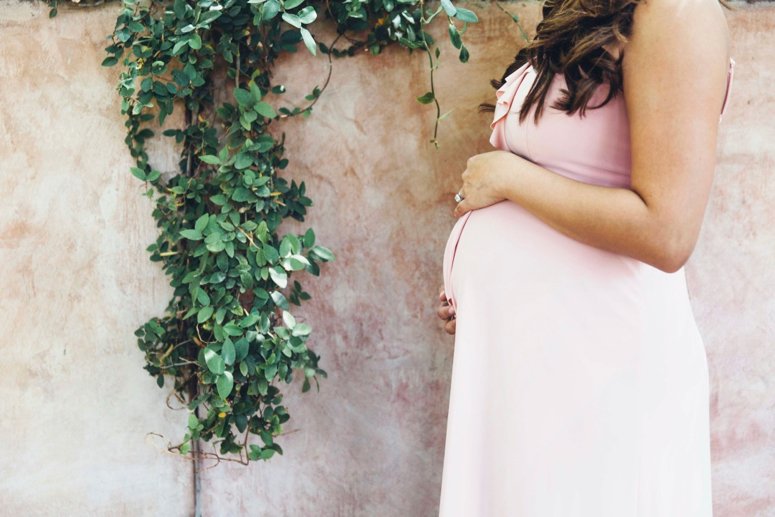 ASOS blush pink ruffle maternity dress. Click to see the rest of the photos from this tea party baby shower on the blog! 