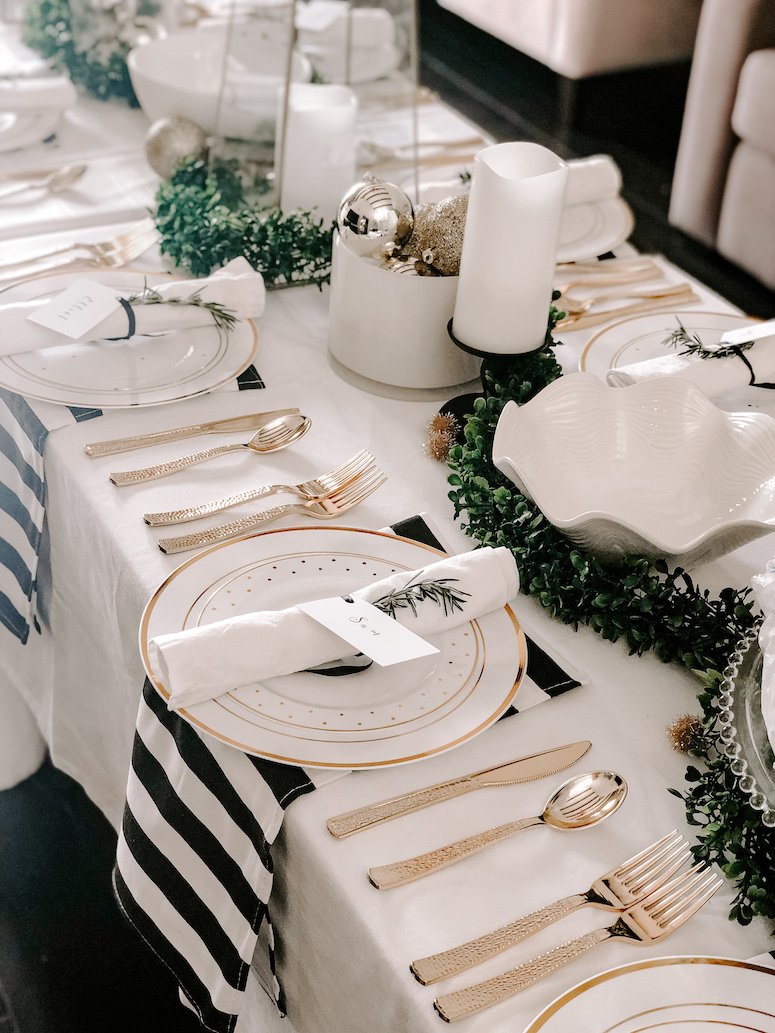 black white and gold table setting new year's eve tablescape idea 